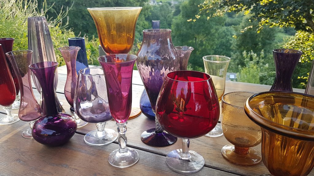 aubergine, red and taupe glass vases some bud vases and some brandy style vases to hire