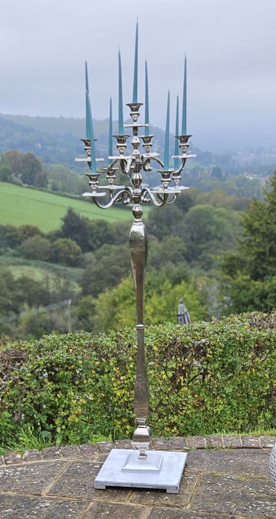 Stunning extra large floor standing silver candelabra with nine arms available to hire