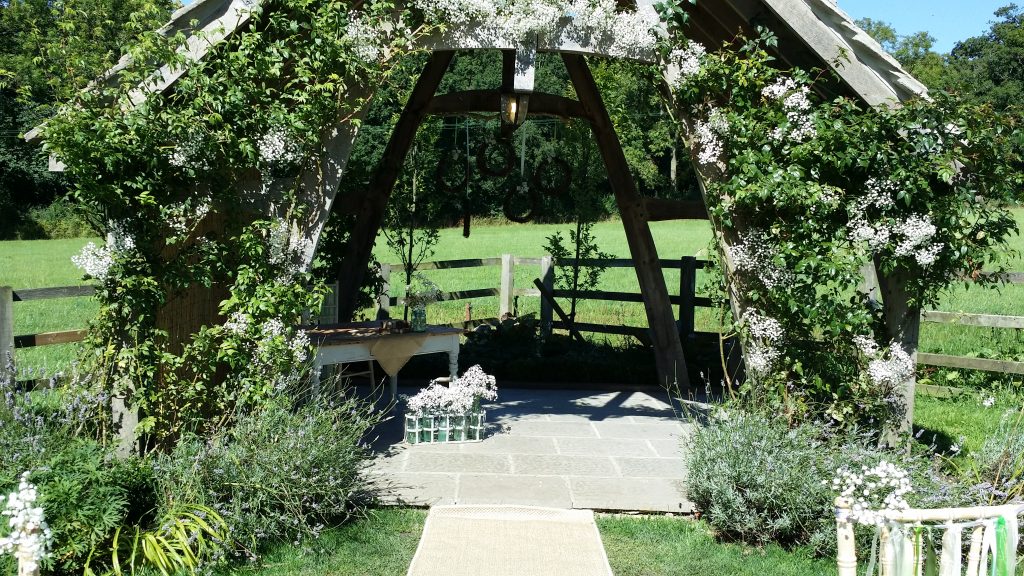 At Hyde Barn in the Cotswolds, we used bunches of Gypsophila and separated them out and fed them into the ivy that wrapped round the ceremony pergola