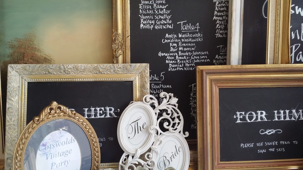A large selection of vintage ornate picture frames with blackboard centres for welcome signs and table plans for hire