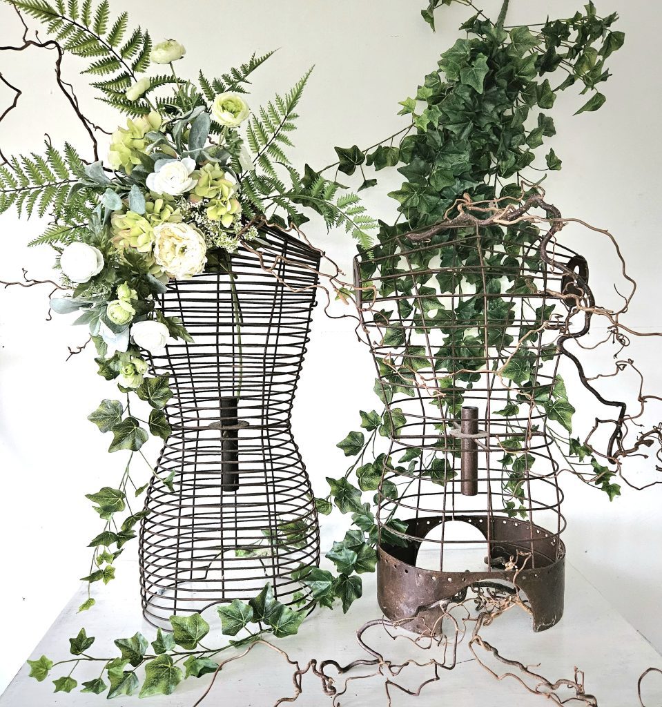 his and hers mannikins dressed with quality fake flowers in whites and greens mixed with quality fake greenery, eucalyptus and twisted willow for hire
