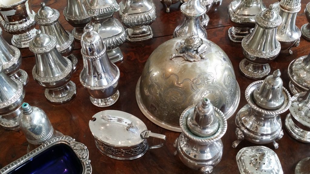 large selection of silver vintage salt and pepper pinch pots to hire
