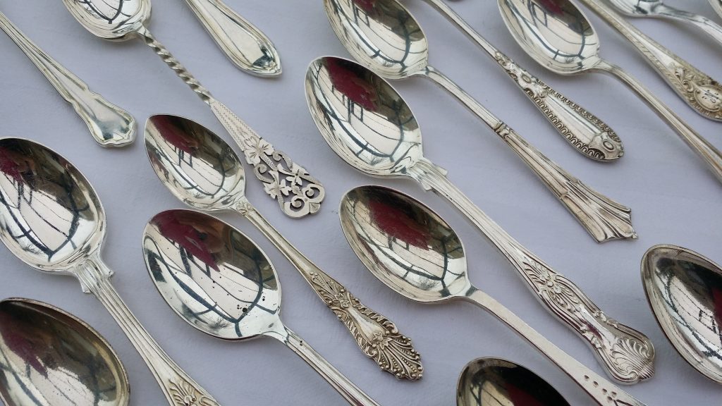 A large quantity product shot of vintage silver tea spoon to hire