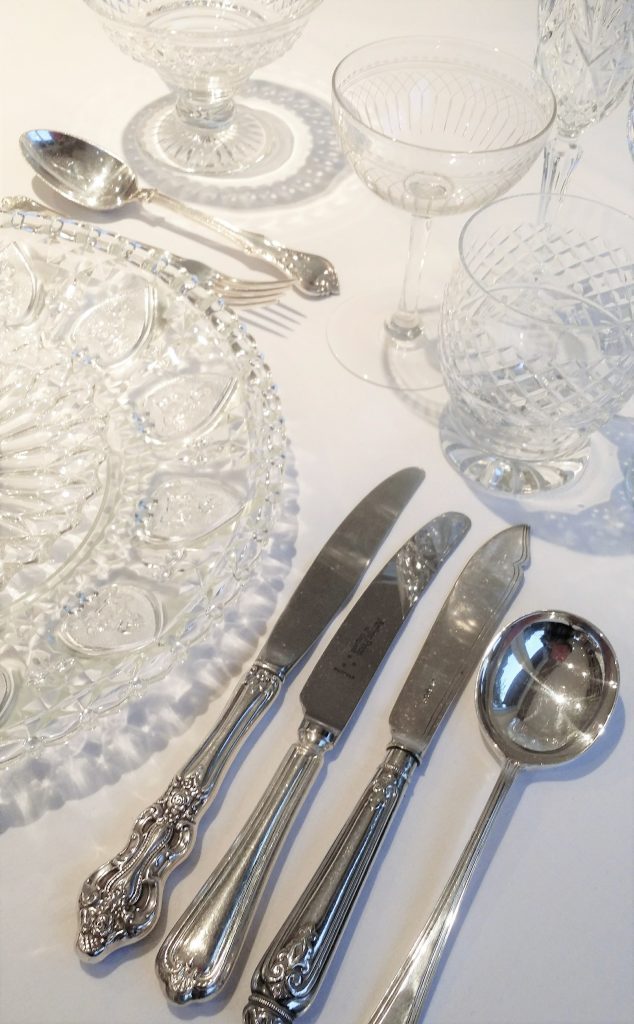 Showing off silver vintage starter, main and fish knife and soup spoon available to hire