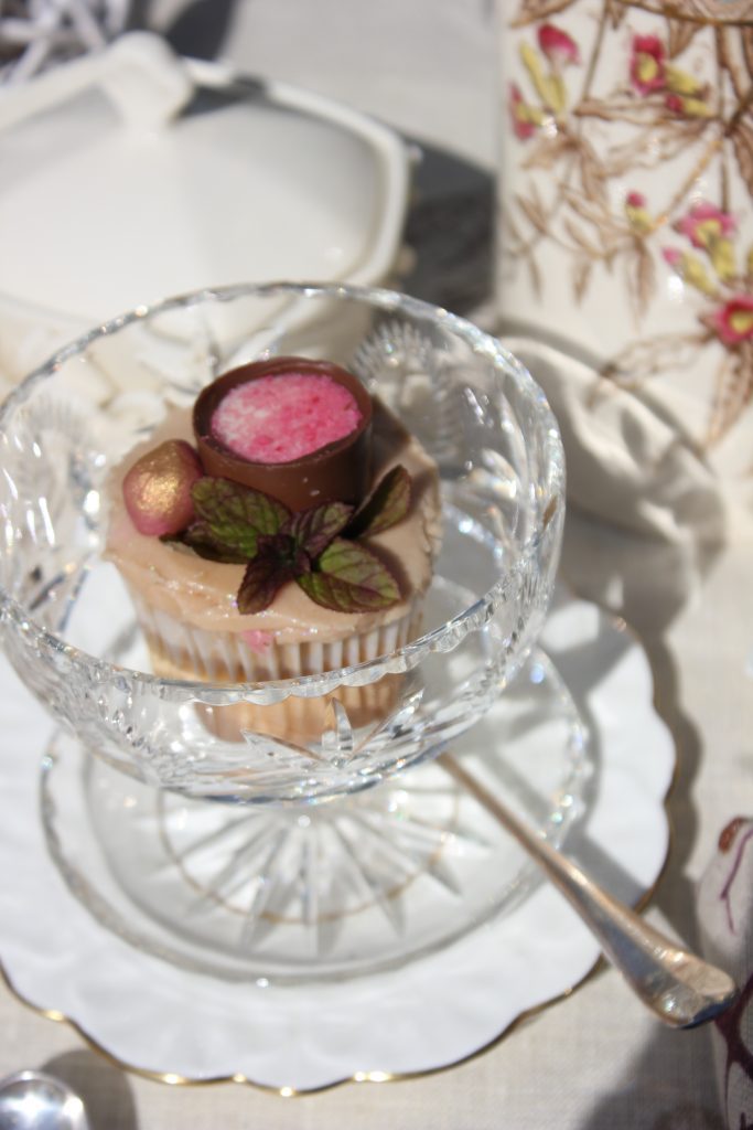 Vintage cut crystal sundae bowl with a silver vintage tea spoon and a mini cupcake with chocolate favour and sprig of mint for hire