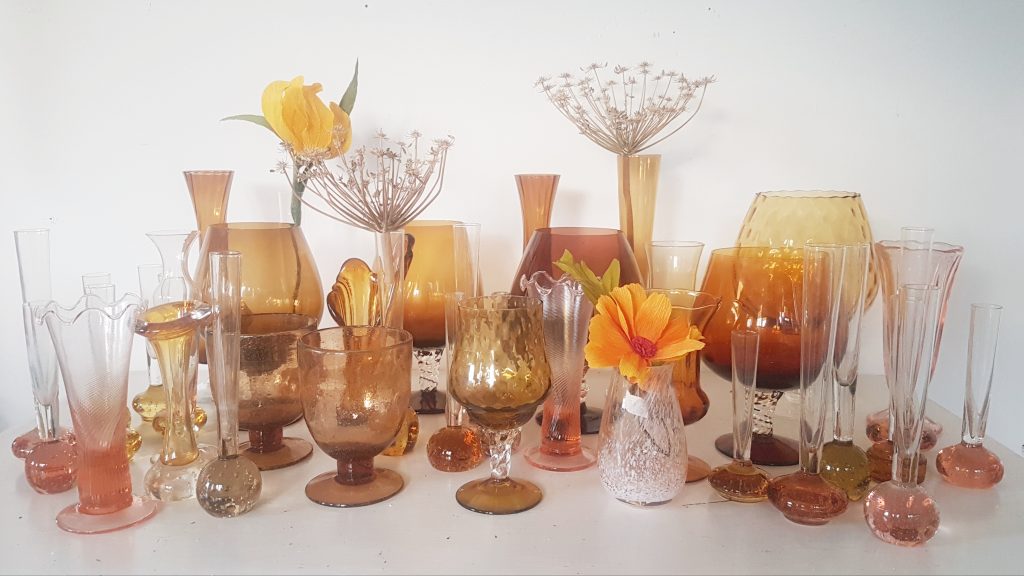 browns, oranges and peach glass vases some bud vases and some brandy style vases