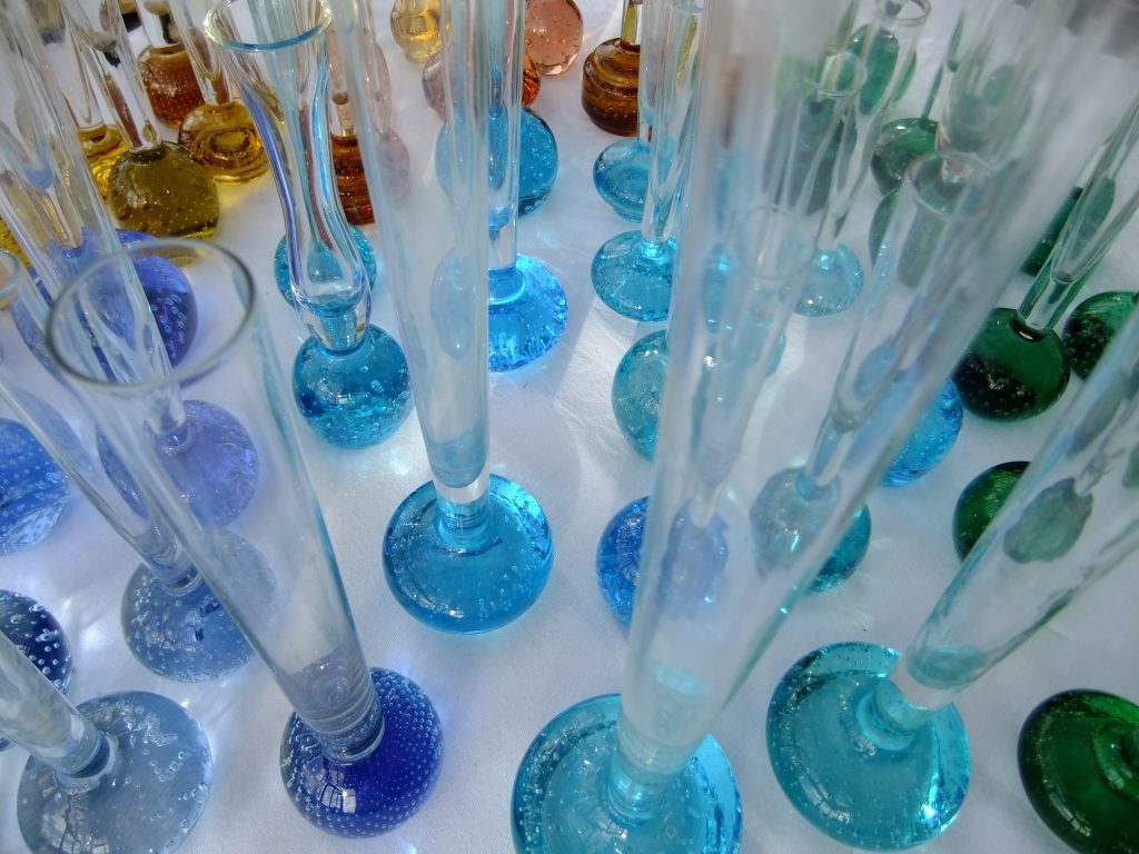 bubble bottom glass bud vases for single stem flowers in blues and greens